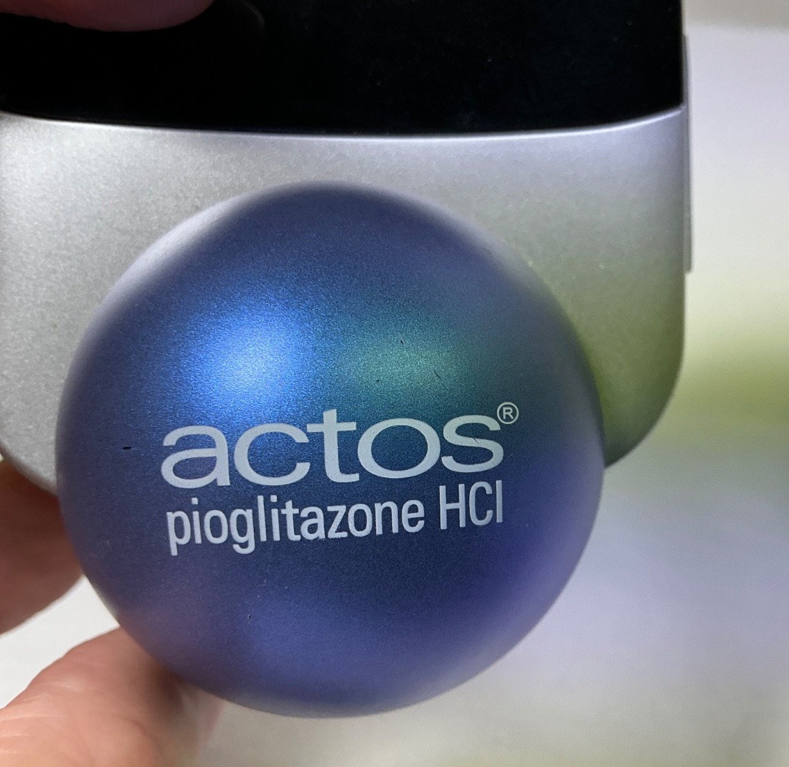 Actos Pharmaceutical Drug Rep Clock Balances On Ball, Works