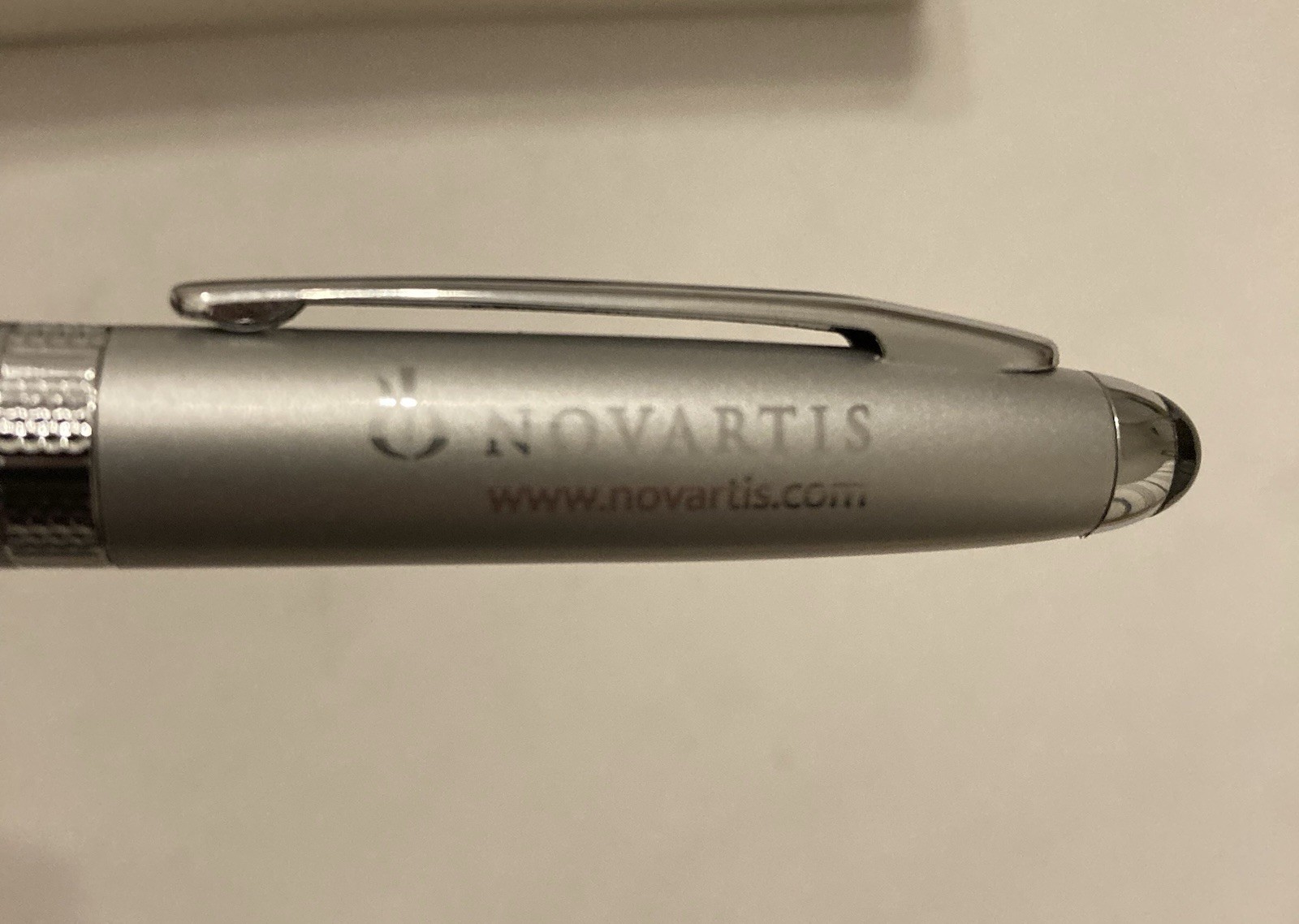 Leed’s Novartis Pharmaceutical Promo Pen NIB Silver Needs Ink Advertising Logo