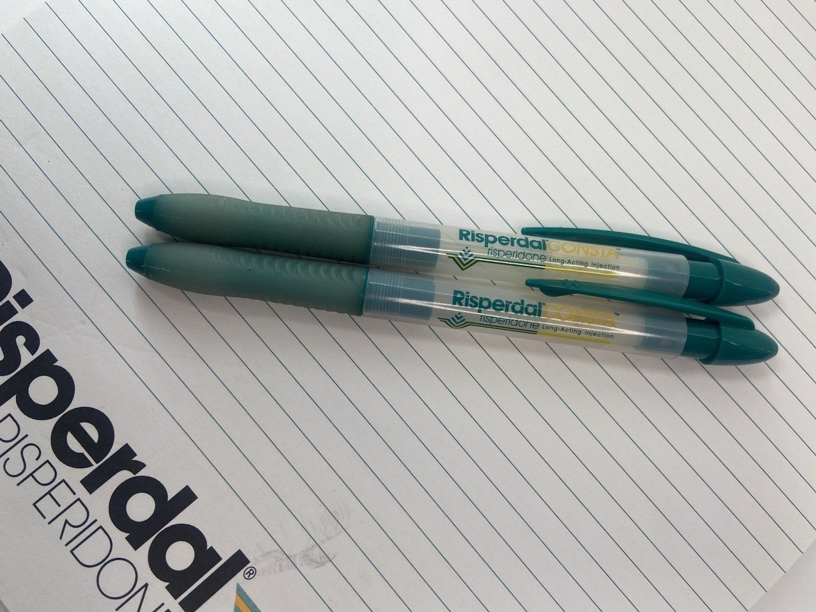 Lot of 2 Risperdal Medical Drug Rep Pharmaceutical Pens White Green And Notepad