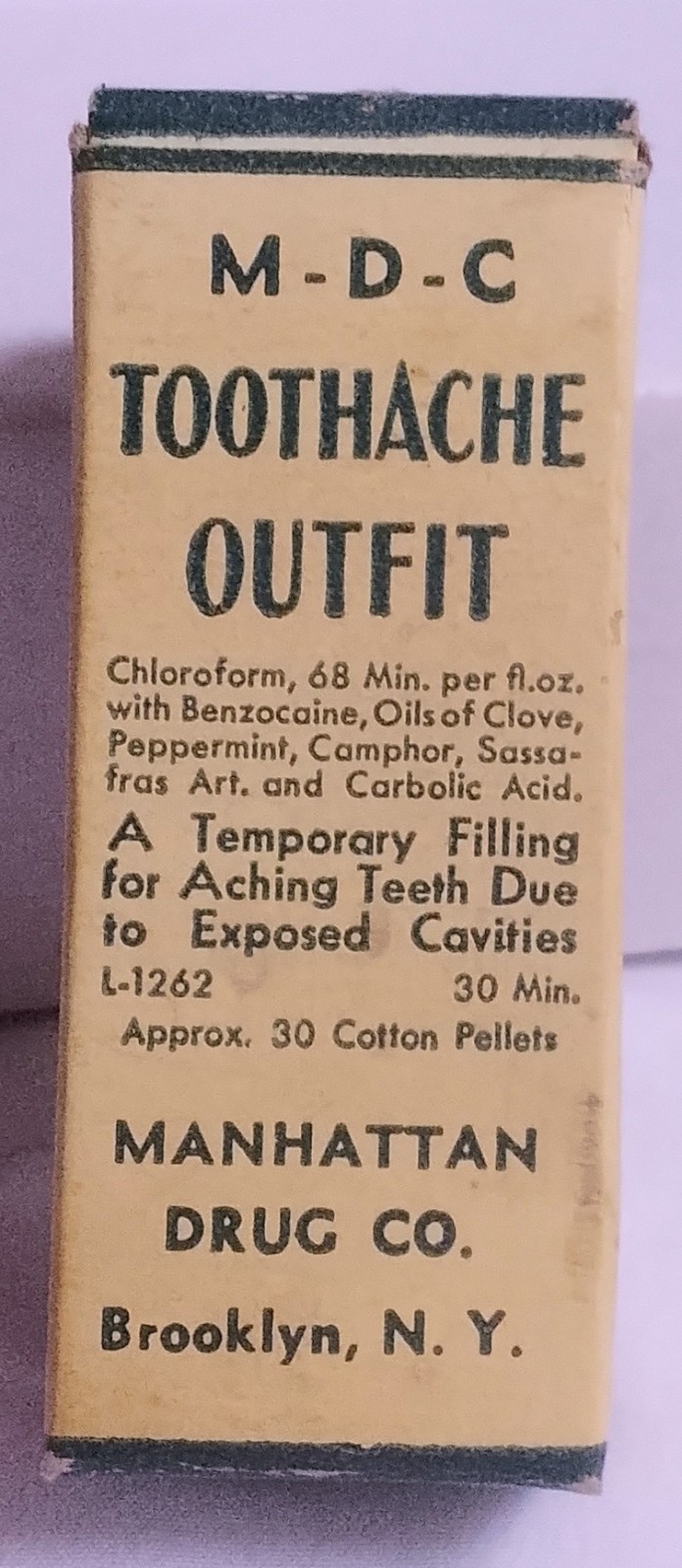 Vintage Manhattan Drug Co. Toothache Outfit with vial, applicator, and box.