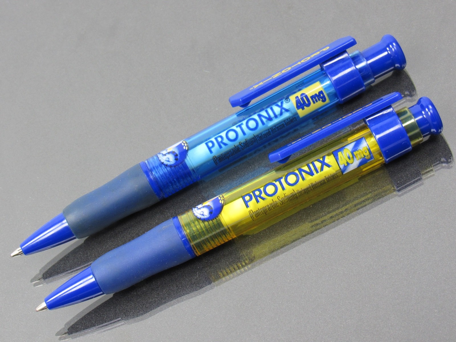 Lot of 2 Protonix PENS Drug Rep Pharmaceutical Advertising GERD Monster