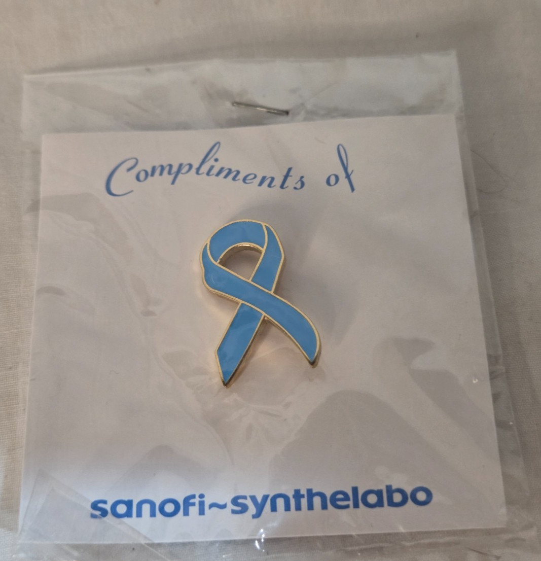 Vintage Sanofi Synthelabo Light Blue Ribbon Prostate Cancer Awareness Lapel Pin