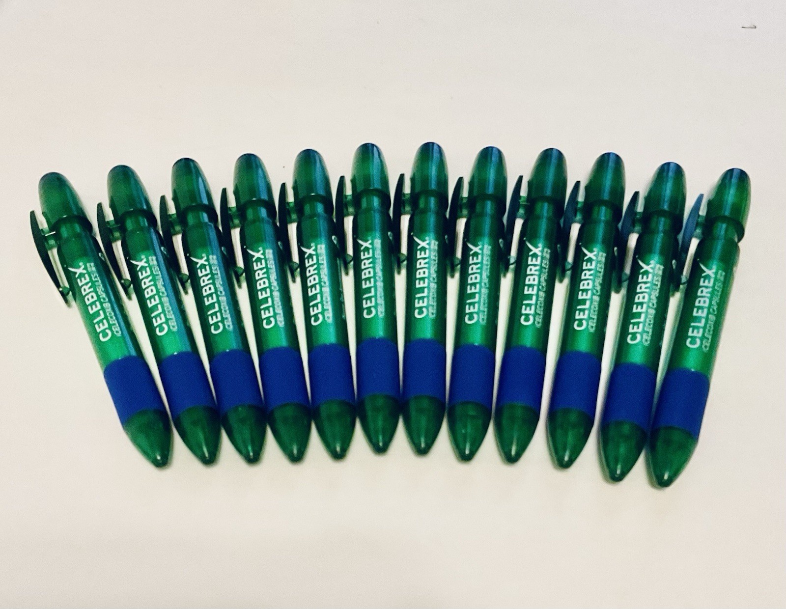 CELEBREX PHARMACEUTICAL REP PENS 5” RETRACTABLE GREEN PURPLE GRIPS LOT OF 12