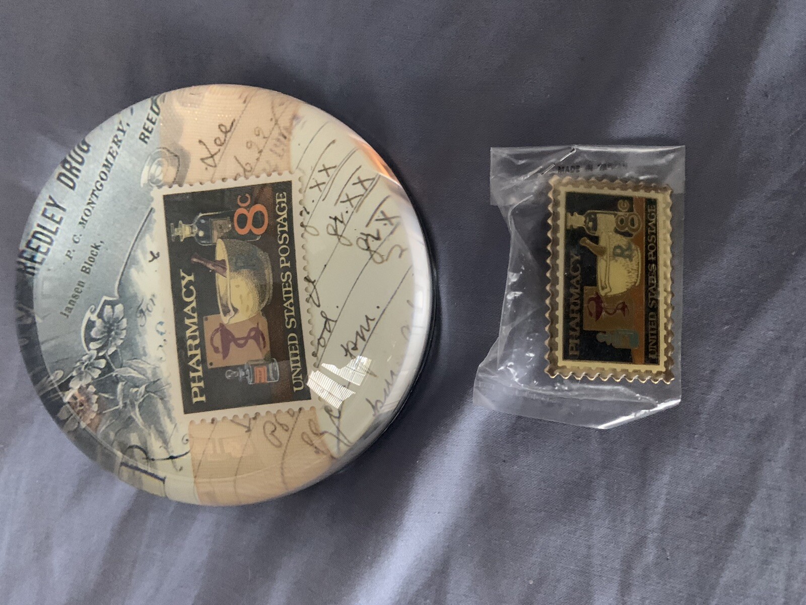 Pharmacy 1972 8-cent Stamp Paperweight and Pin (used)