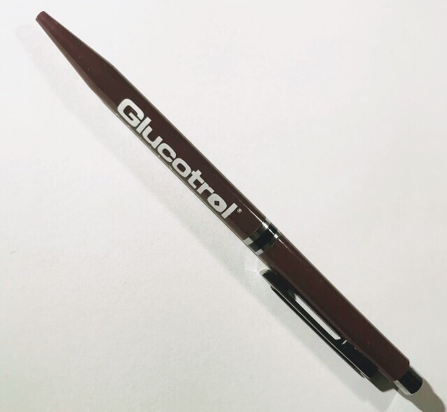 GLUCOTROL Pfizer DRUG REP PHARMACEUTICAL Vintage Collectible Maroon Click PEN