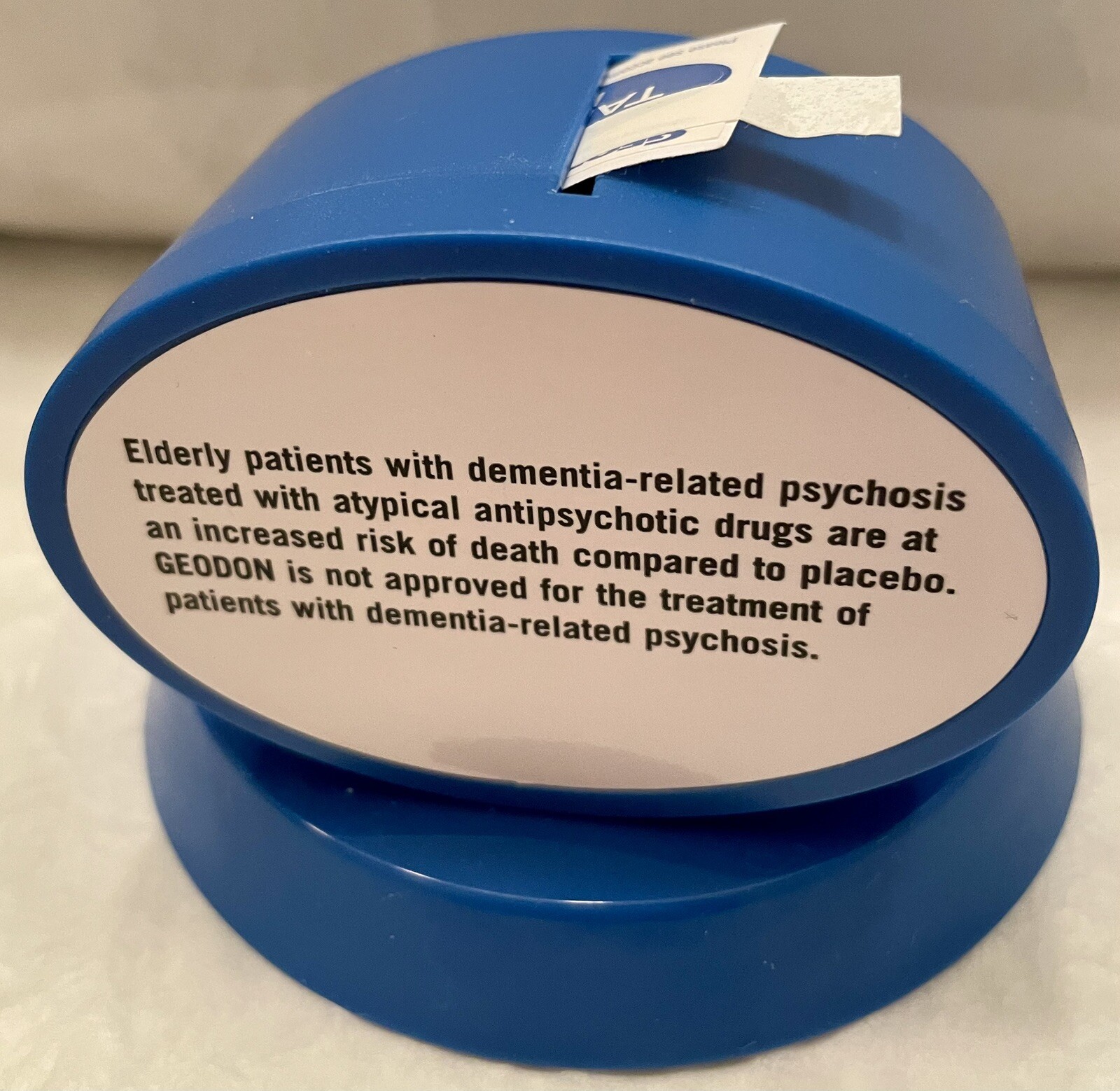 VTG GEODAN 2006 BLUE STICKER DISPENSER/PAPERWEIGHT Pharma Advertising Rep Logo