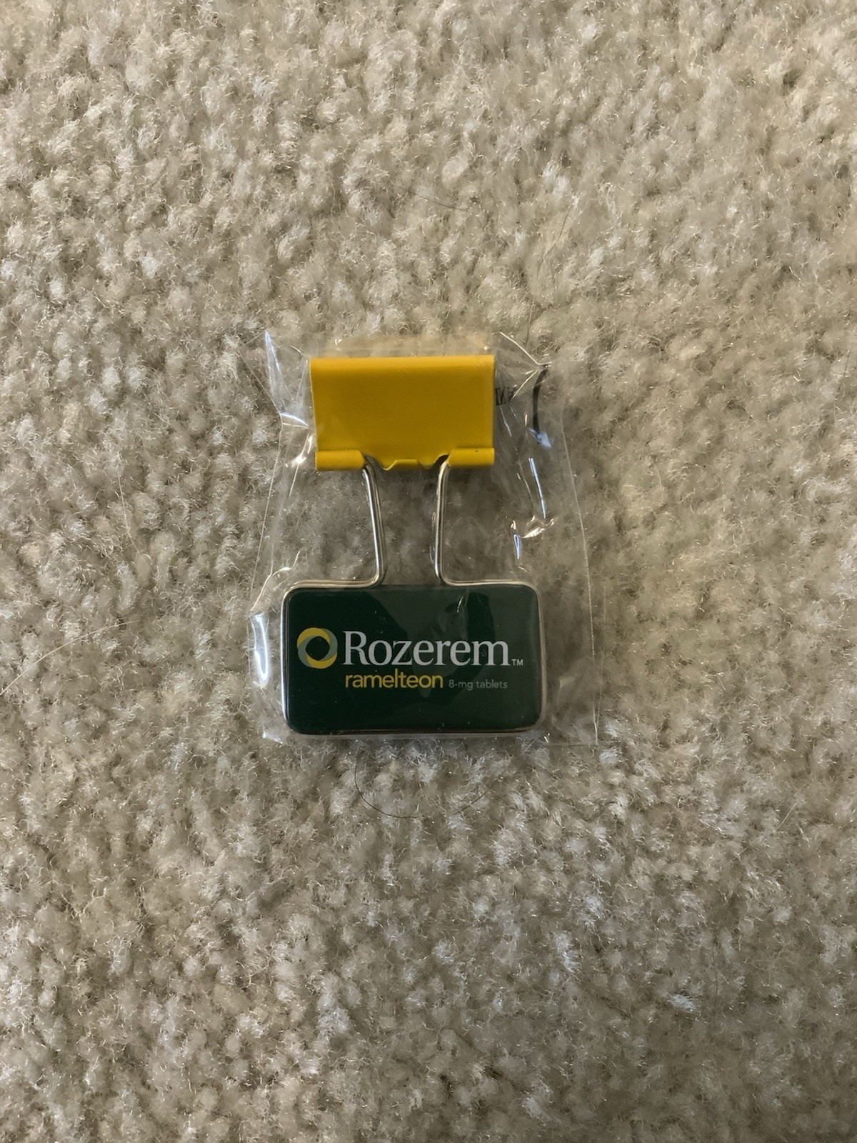 VINTAGE ROZEREM GREEN/YELLOW BINDER CLIP PHARMACEUTICAL DRUG REP LOGO NEW