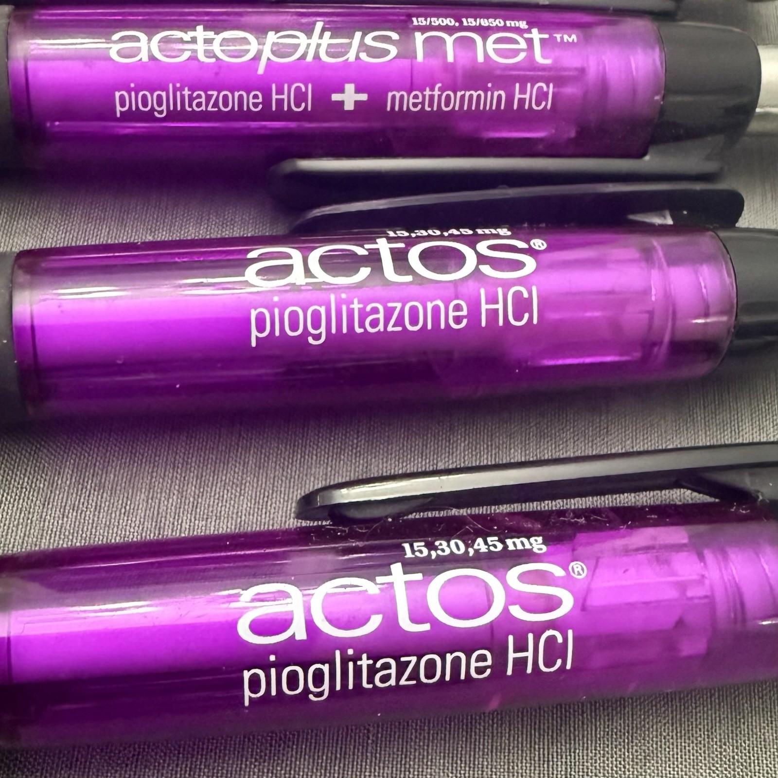Lot of 4 Purple Pharmaceutical Promo Pens Actos Actoplus Met Rubber Grip Click