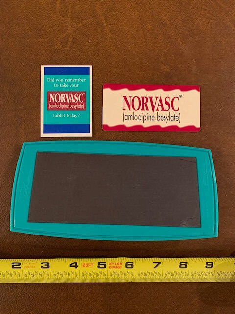 Drug Rep large Magnetic Norvasc business card holder and 2 Norvasc magnets.