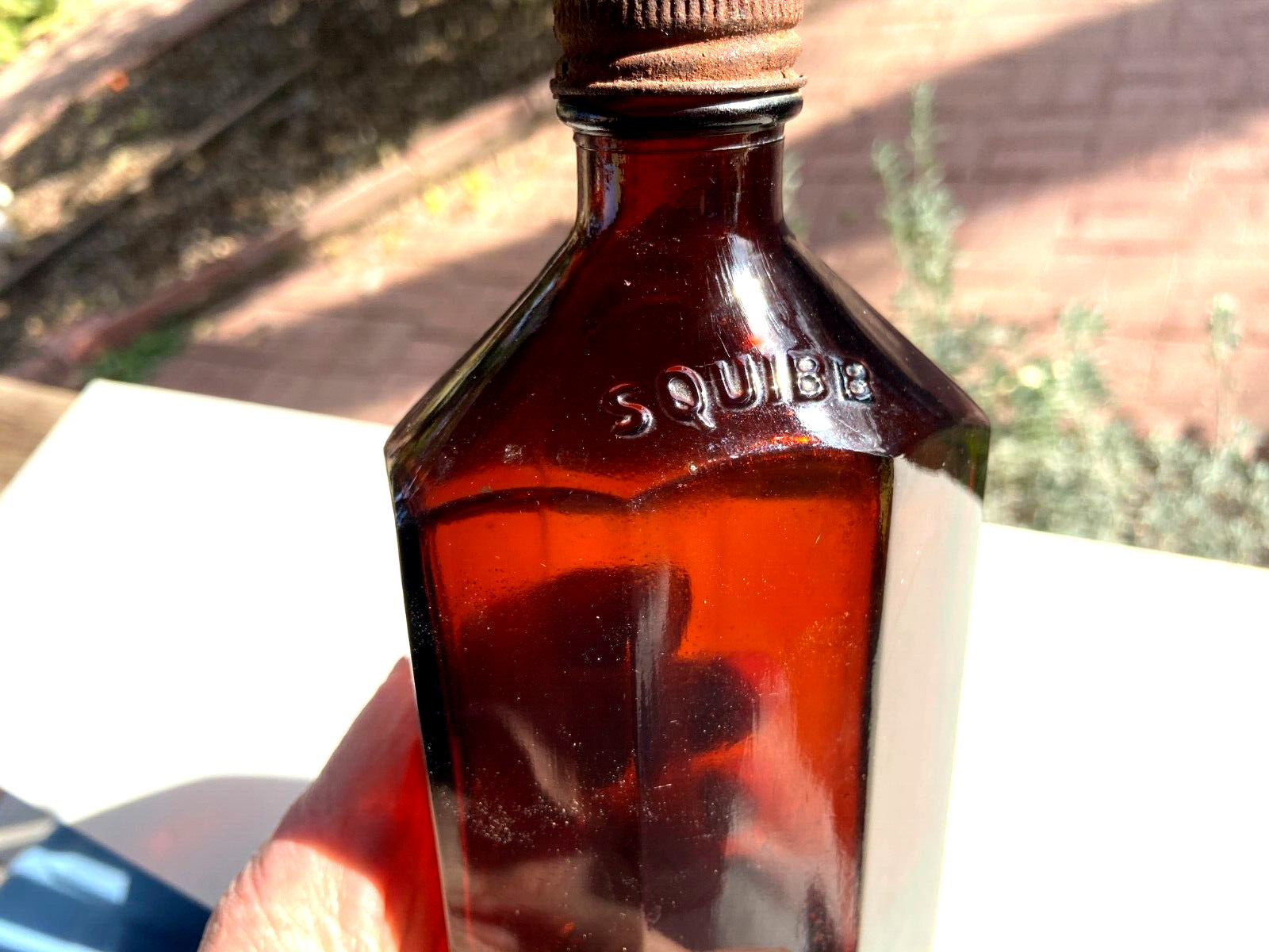 BEAUTIFUL Antique Amber Squibb embossed Glass Drug or Pharmacy Jar, 7” Tall