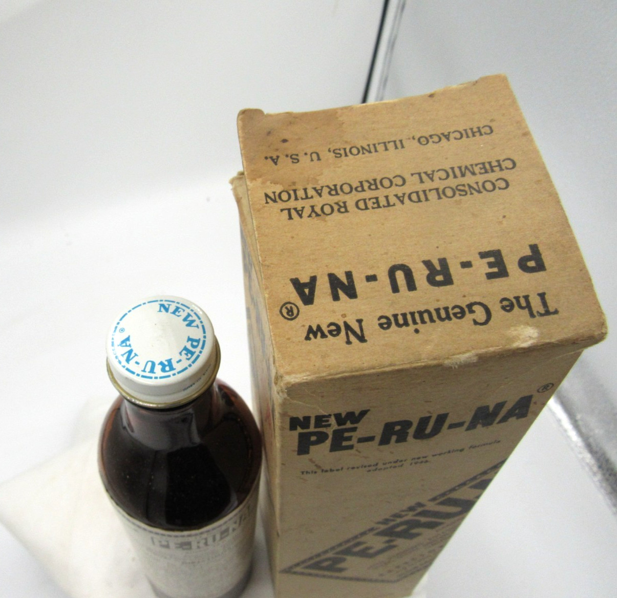 BW – 1950’s Pe-Ru-Na Iron Tonic Chicago Ill 8 5/8 ” Amber Medicine bottle