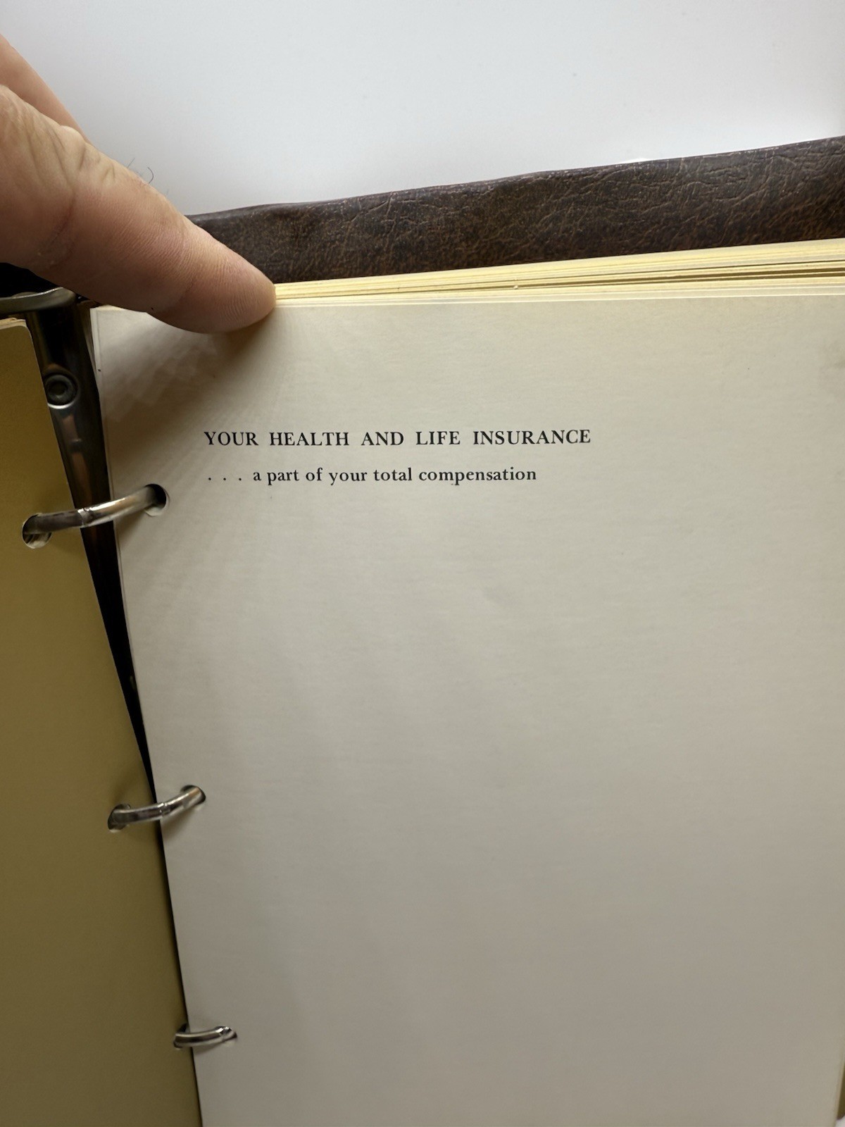 1976 Eli Lilly Employee Information binder – pay, insurance, credit union info