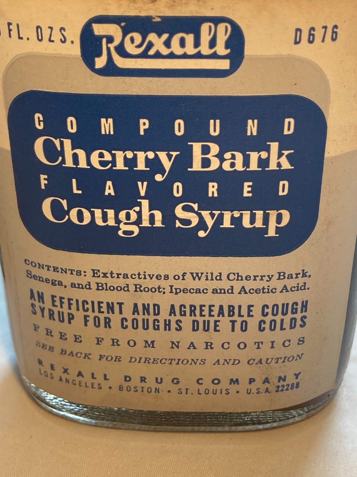 c1950s Compound Cherry Bark flavored Cough Syrup Rexall Drug Company Bottle