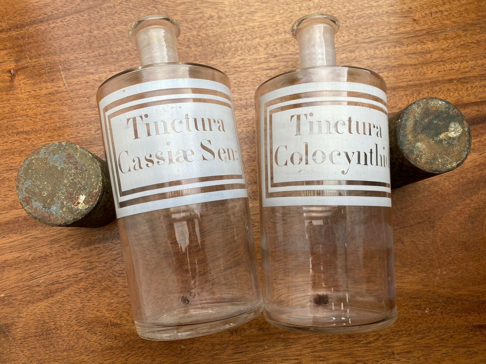 A PAIR OF ANTIQUE FRENCH APOTHECARY BOTTLES 8″ WITH LIDS / ACID ETCHED LABELS