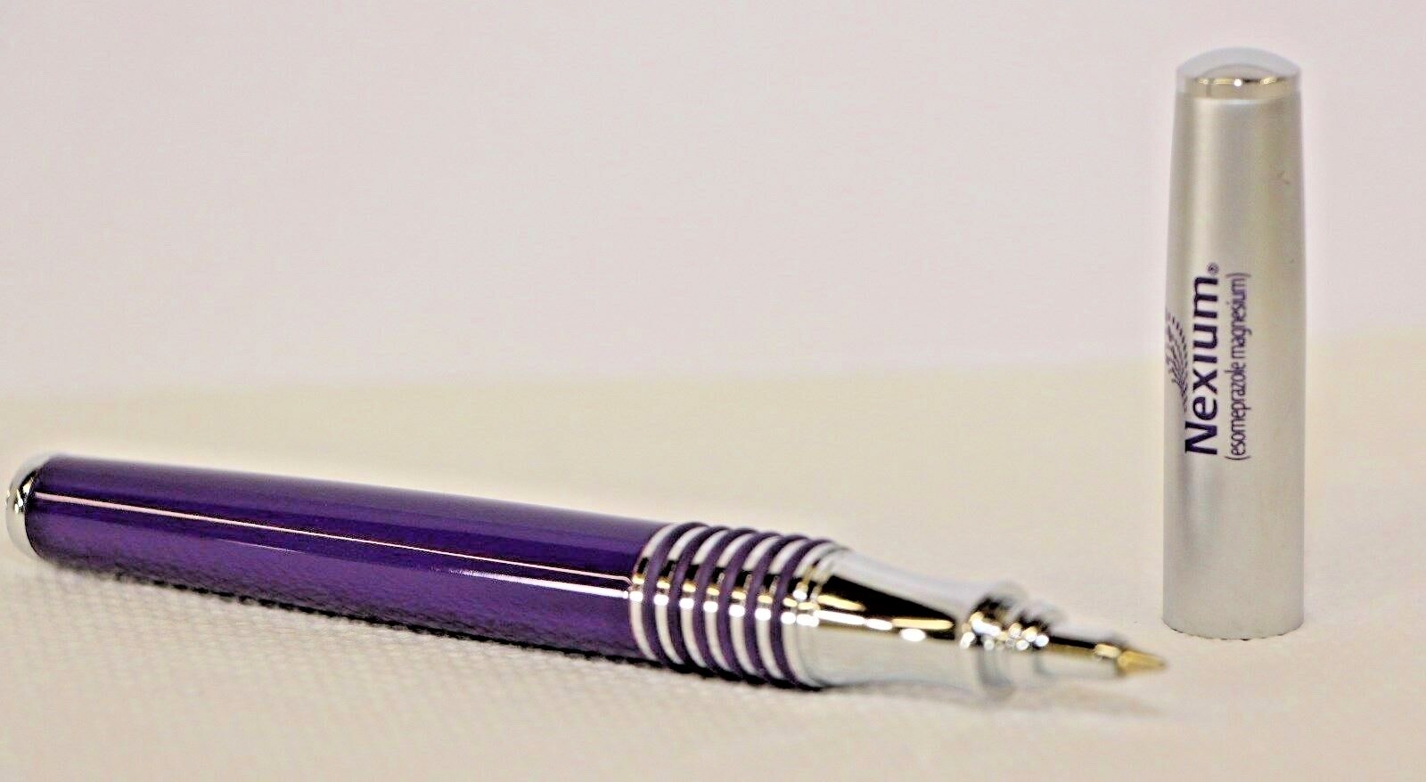 Pharmaceutical Heavy Metal NEXIUM Purple and White New in Sleeve
