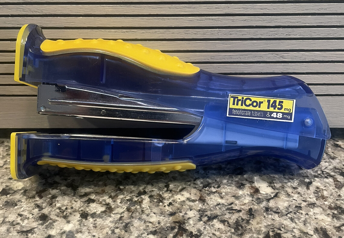 Tricor/Fenofibrate Drug Rep Pharmaceutical Collectible Stapler & Pen Light