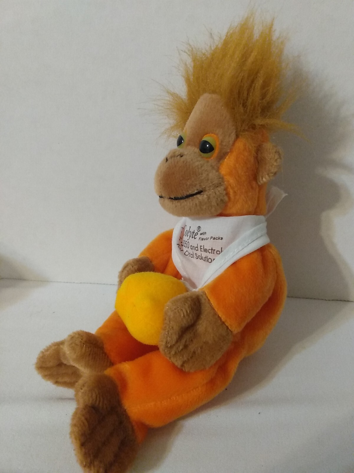 Orange Monkey Plush Holding Ball Toy 8″ Pharmaceutical advertisingSemo