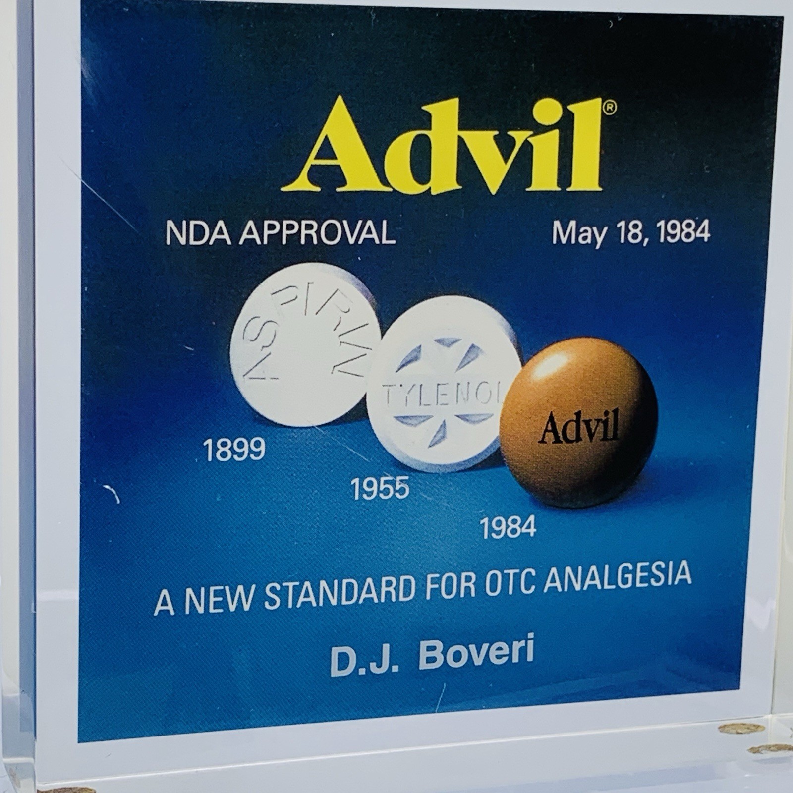 Vintage Advil commemorative acrylic desk plaque Paperweight 1984 Pharmaceutical