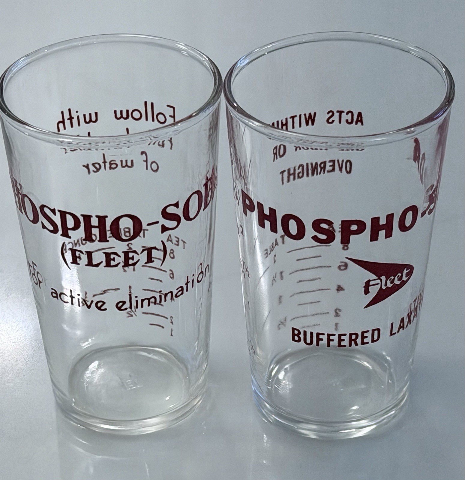 Two Small VINTAGE ADVERTISING MEASURING Glass FLEET LAXATIVE PHOSPHO-SODA