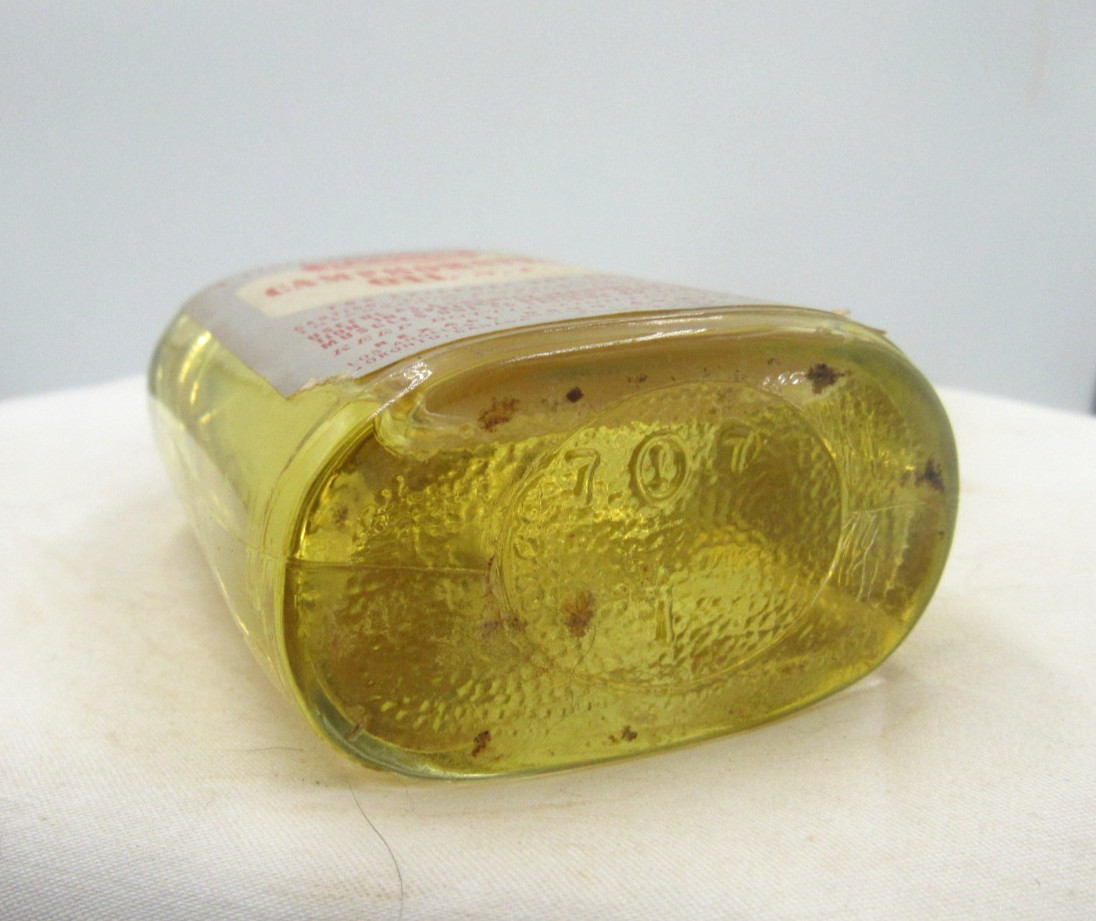 1940’s Rexall Caphorated Oil Los Angeles C 4 3/4 inch tall Clear Medicine Bottle