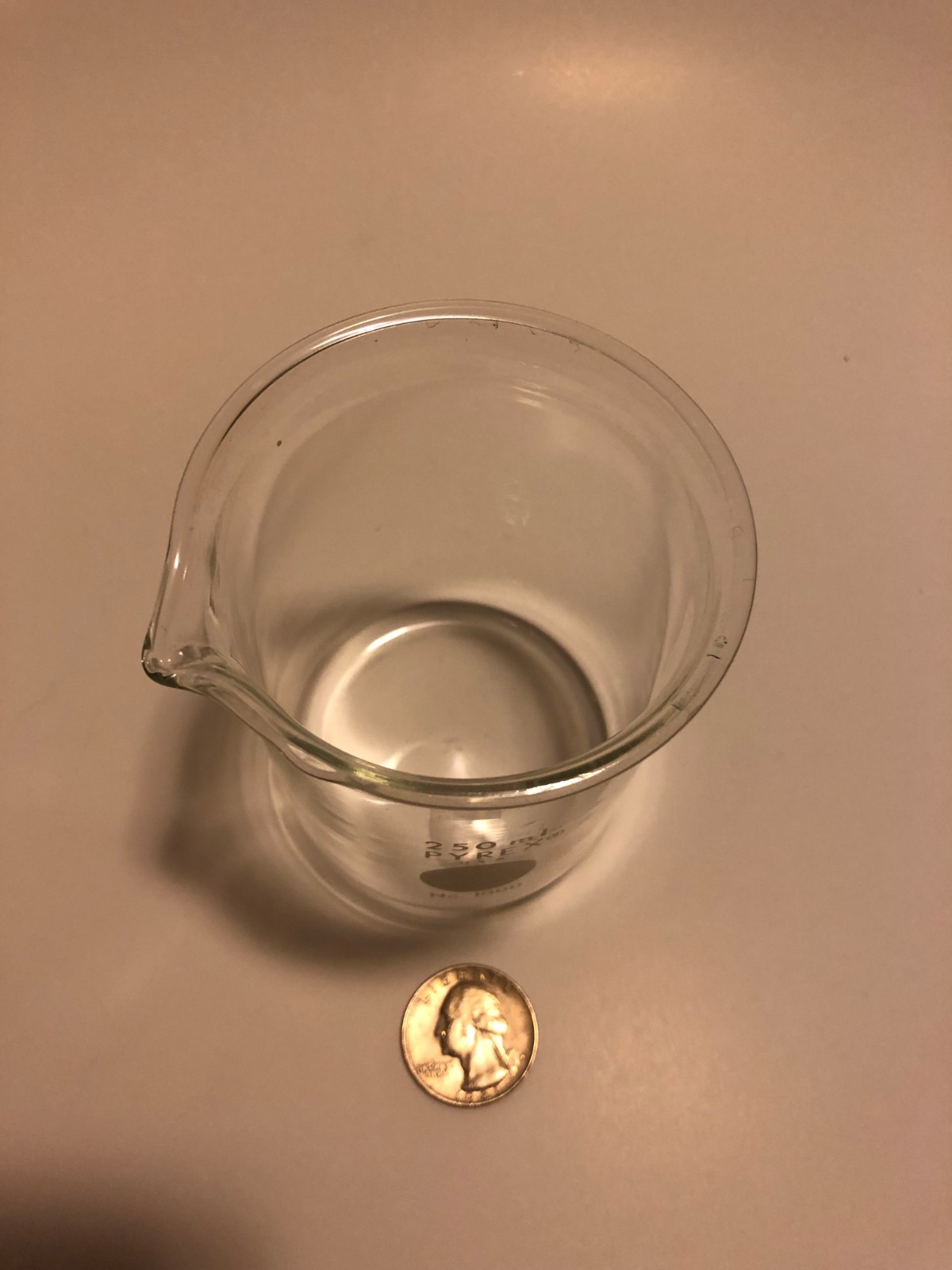 Pyrex Glass Beaker, 250 ml, 2-5/8-inch outside diameter, used.