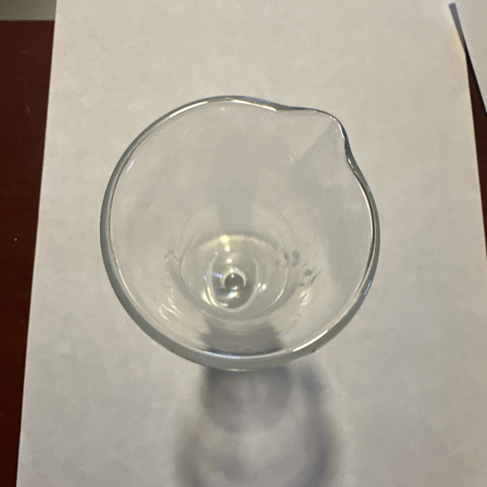 A Pharmacy Glass Graduate 8 Fluidrachms And One Fluidounce.