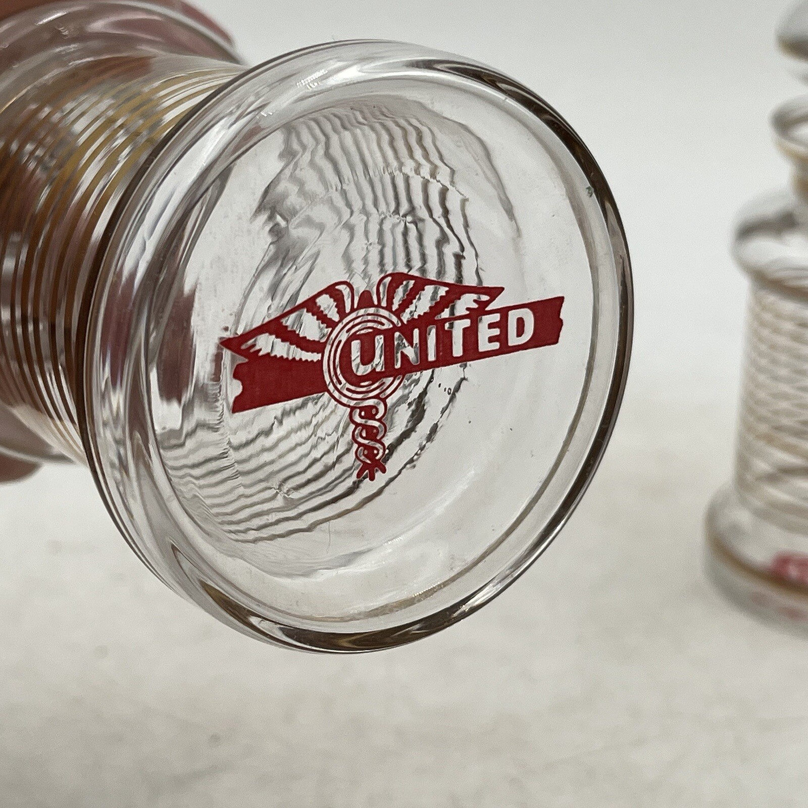 4- VTG WW2 APOTHECARY Jar Glass Medical Canister Winged United Logo Medicinal