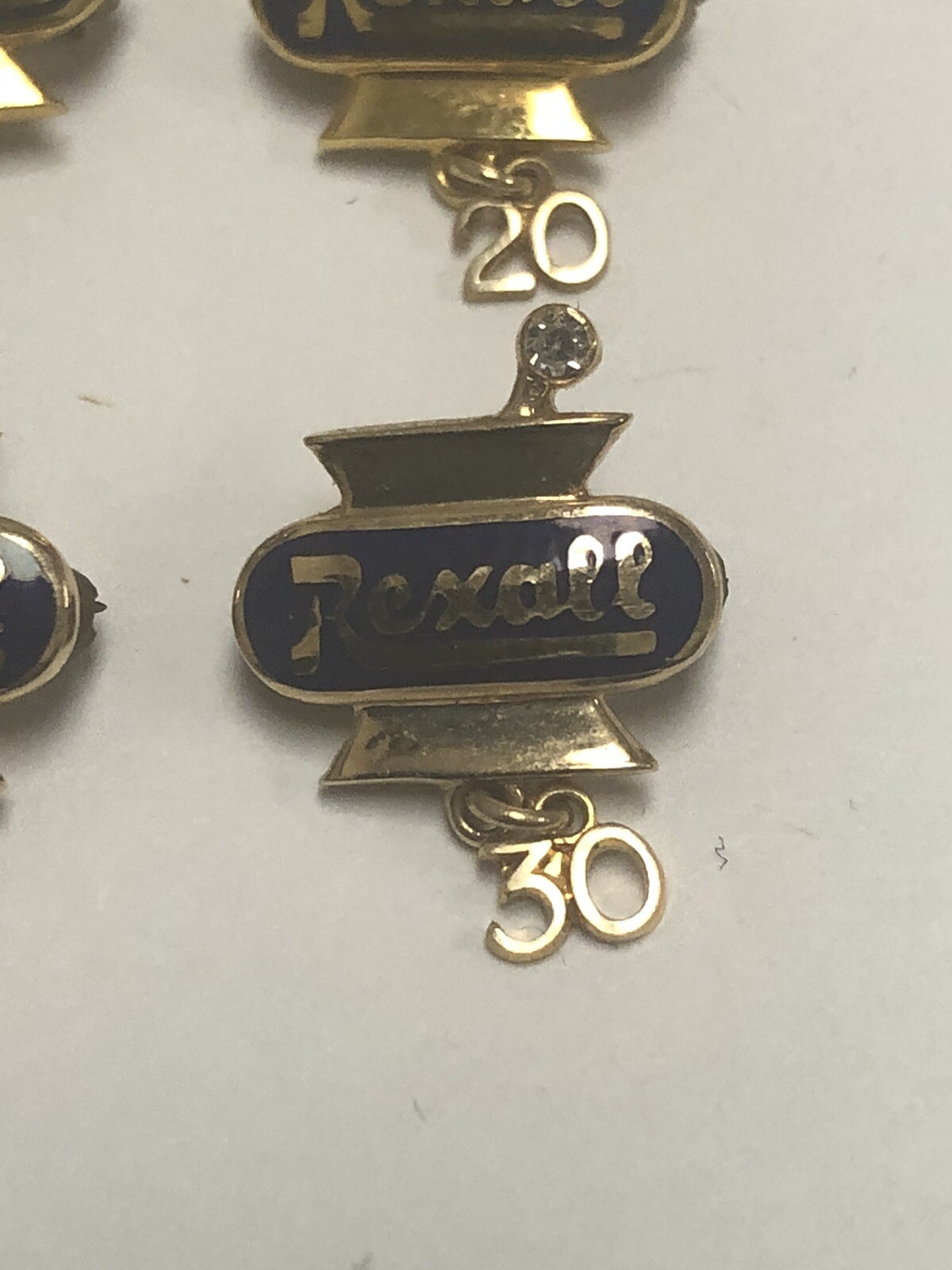 VINTAGE REXALL DRUG SET OF FOUR 14k YELLOW GOLD PINS – 15, 20, 25, 30 YEARS