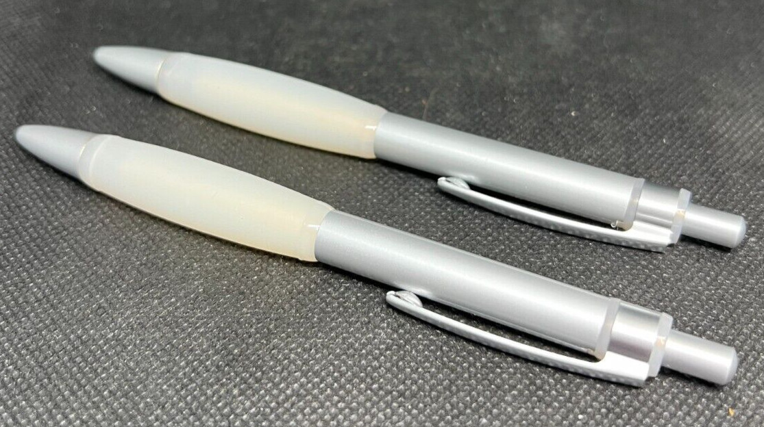 LOT of 2 ENBREL Heavy Metal Medical Drug Rep Pharmaceutical Pens Advertising
