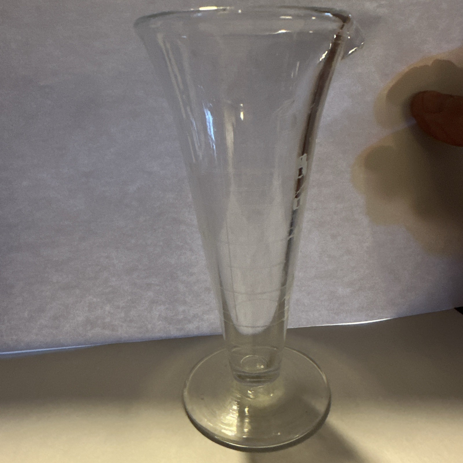 A Pharmacy Glass Graduate 8 Fluidrachms And One Fluidounce.