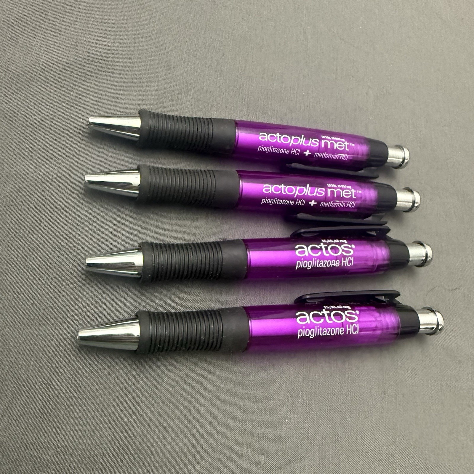 Lot of 4 Purple Pharmaceutical Promo Pens Actos Actoplus Met Rubber Grip Click