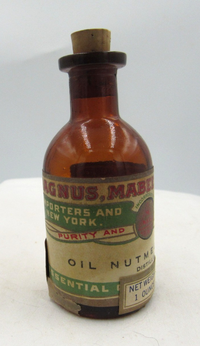 BW – 1920’s Magnus, Mabee & Reynard Oil of Nutmeg 3 1/4 ” Amber Medicine bottle