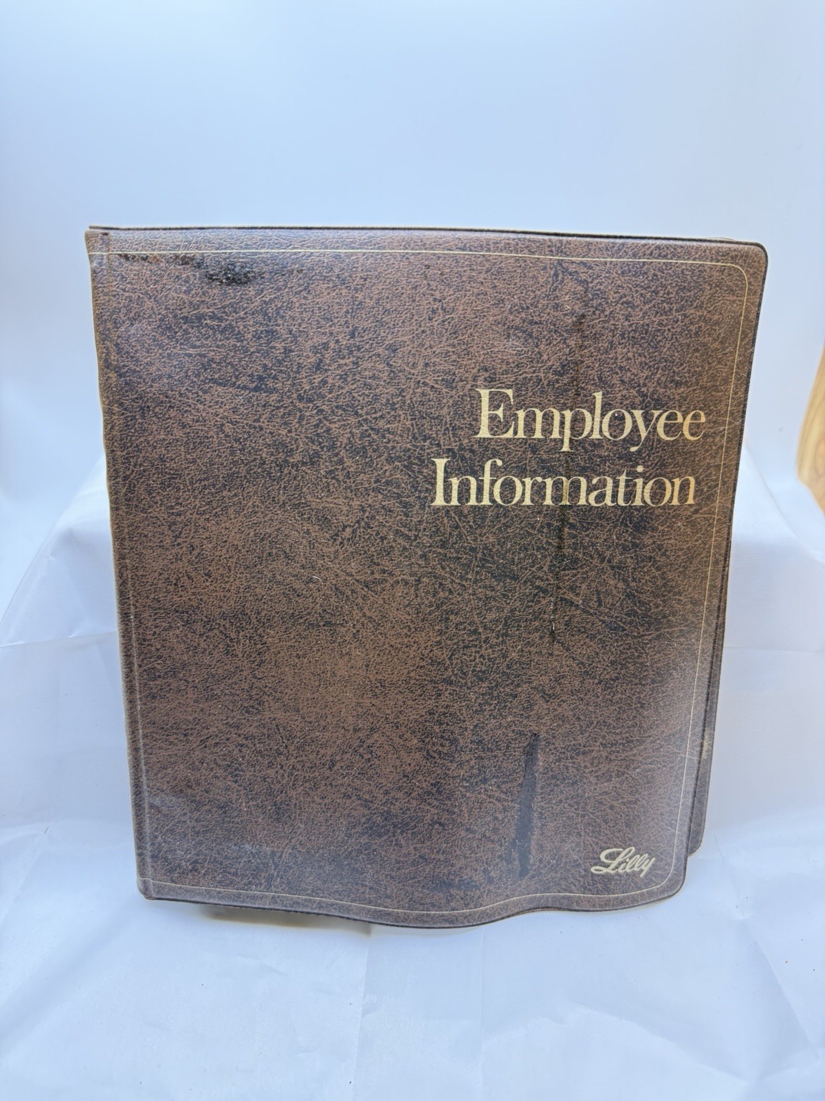 1976 Eli Lilly Employee Information binder – pay, insurance, credit union info