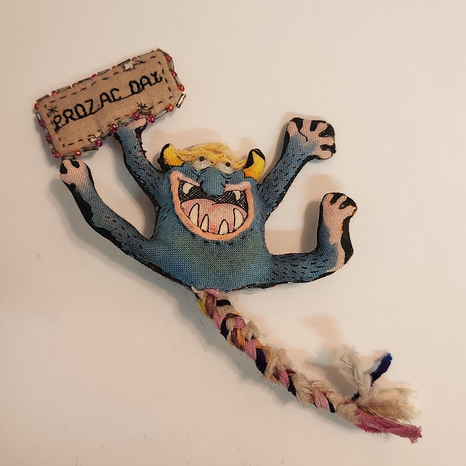 Vintage Hand Made ” Prozac Day ” Cloth Stuffed Goblin Monster Googley Eyes Pin