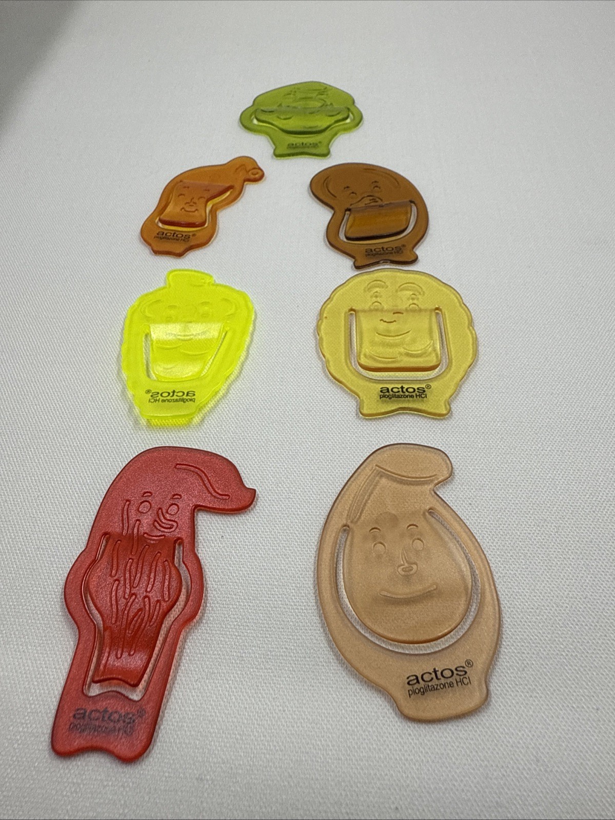 7 Actos MultiColor Paperclips Pharmaceutical Drug Rep Anthropomorphic Rare HTF
