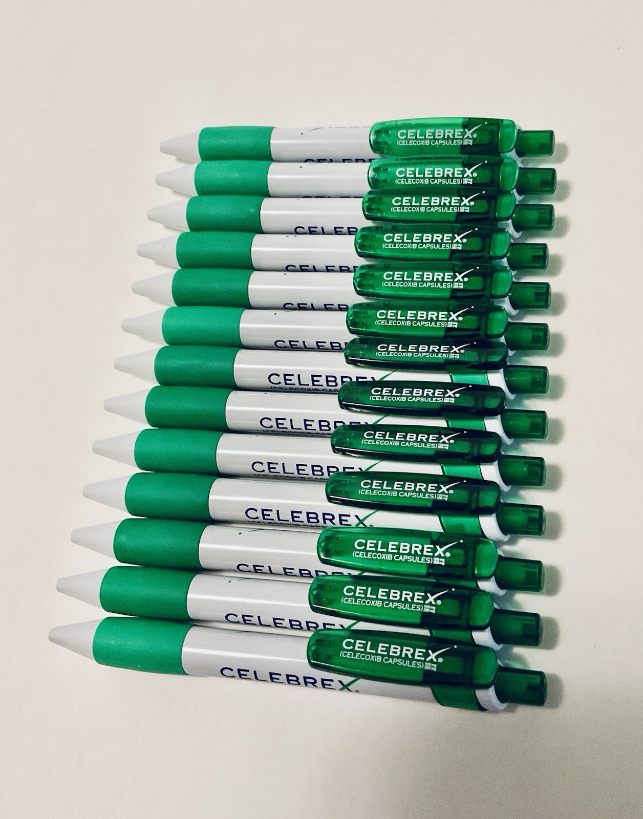 CELEBREX PHARMACEUTICAL REP PENS 5” RETRACTABLE WHITE GREEN GRIPS LOT OF 13