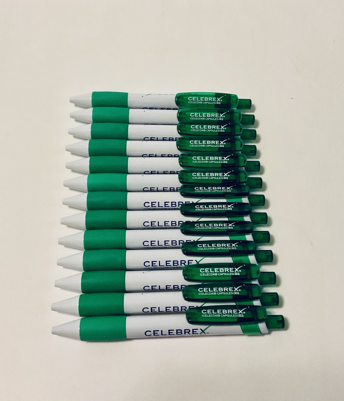CELEBREX PHARMACEUTICAL REP PENS 5” RETRACTABLE WHITE GREEN GRIPS LOT OF 13